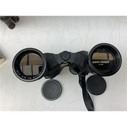 Cast metal nutcracker, in the form of a dog together with a pair of Swift Saratoga 8x40 binoculars in leather case and a hip flask, the glass flask covered in leather to the top with a detachable silver plated cup to base