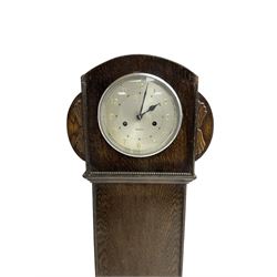 Westclox 1950’s 8-day grandmother clock in an oak case. No pendulum.