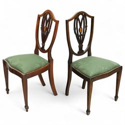 Hepplewhite design mahogany set of ten dining chairs, two carvers and eight dining chairs, with inlaid oval medallion to the vase splat, green upholstered drop-in seats, on square section tapering supports with spade feet, including two carvers