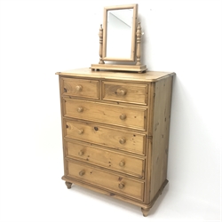Solid pine chest fitted with two short and four long drawers, turned supports (W98cm, H121cm, D51cm) with pine framed swing mirror 