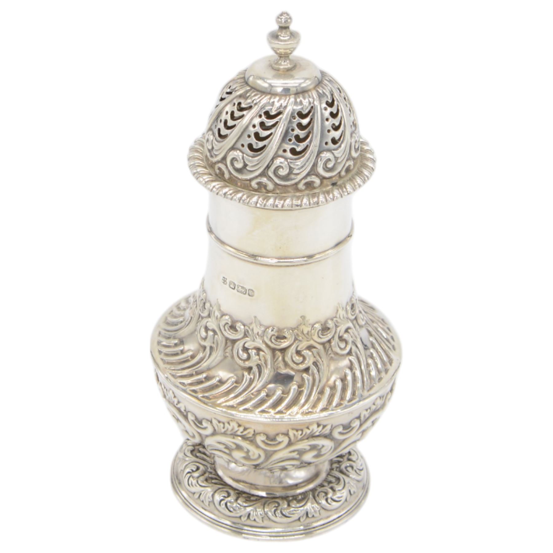 Late Victorian silver sugar caster, of typical waisted form, with embossed scrolling and foliate decoration and urn finial to removable pierced cover, upon circular foot, hallmarked Fenton Brothers, Sheffield 1895, H19cm