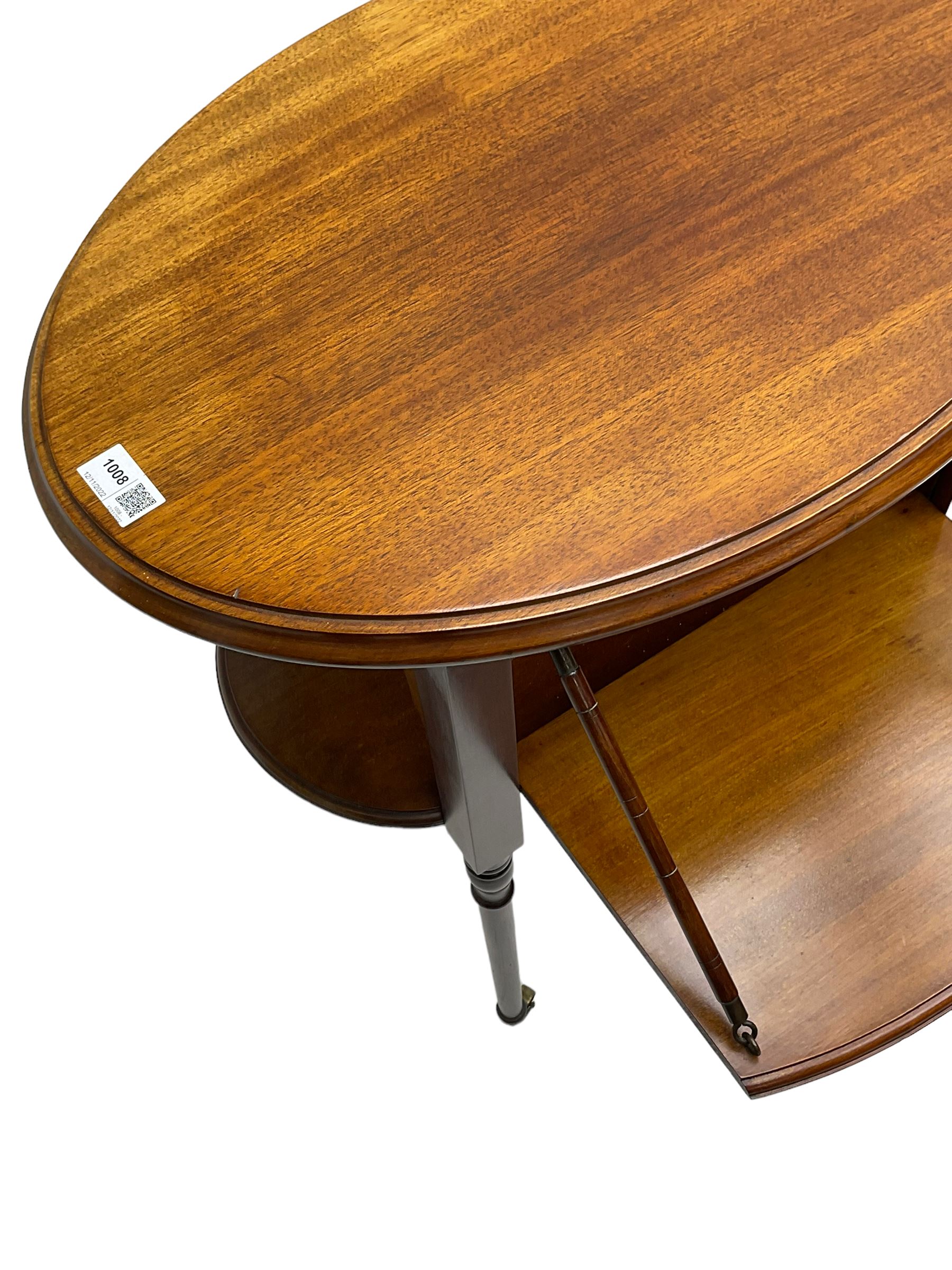 An unusual Edwardian mahogany drop leaf centre table, oval form with two drop leaves on sliding