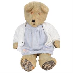 Eight early 20th century and later teddy bears, to include three straw filled examples with jointed limbs, tallest H58cm
