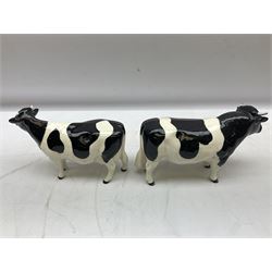 Seven Beswick cow figures, to include Friesian bull Ch. ''Coddington Hilt Bar'' no. 1439a, Friesian cow Ch. 'Claybury Leegwater' no. 1362a and Friesian calf no. 1249C, Aberdeen Angus calf 1827a, Jersey cow no. 1345 etc, all with printed mark beneath  