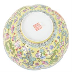 Chinese famille jaune eggshell porcelain bowl, decorated with dragons and foliage, upon hardwood stand, D26cm