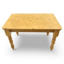 Late 20th century pine farmhouse dining table, rectangular top raised on turned legs, together with a set of matching spindle-back chairs with padded seats