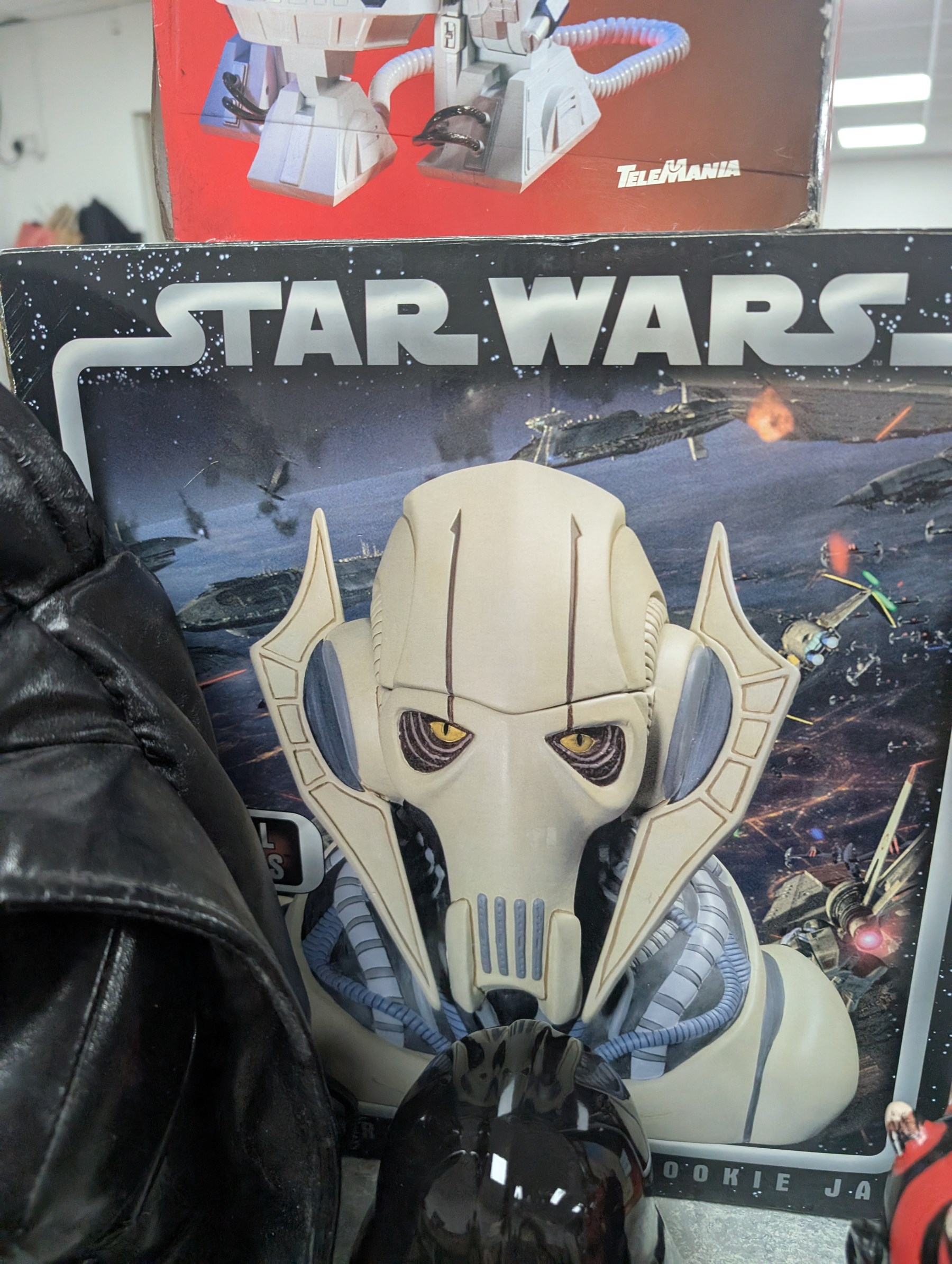 Star Wars collectables, including Neca General Grievous cookie jar,R2-D2 telephone, Episode I chess set, puzzle, Darth Vader back pack and two money boxes