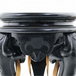 Elephant ebonised jardinière, moulded circular top raised on carved Elephant supports united by a shaped undertier
