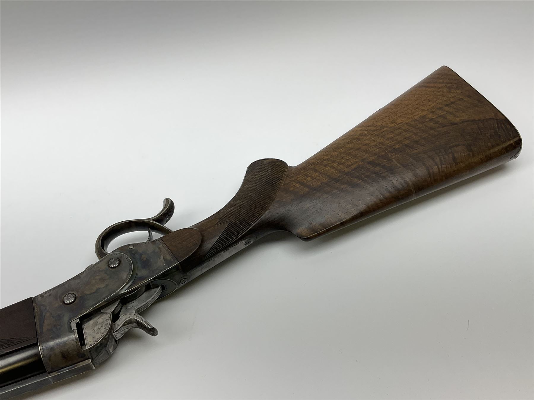 Rare Henry Pieper Liege seven-chambered solid barrel 297/30 calibre rim-fire volley gun with six barrels around a central seventh barrel drilled for simultaneous fire, built on a Remington type rolling block action, blued 62cm barrel with raised rib and twin rear leaf sights, case hardened action complete with loading plate for seven cartridges, walnut stock with chequered pistol grip and fore-end and inset 'silver' cartouche with two Chinese type characters, no.256PLN, L109cm overall