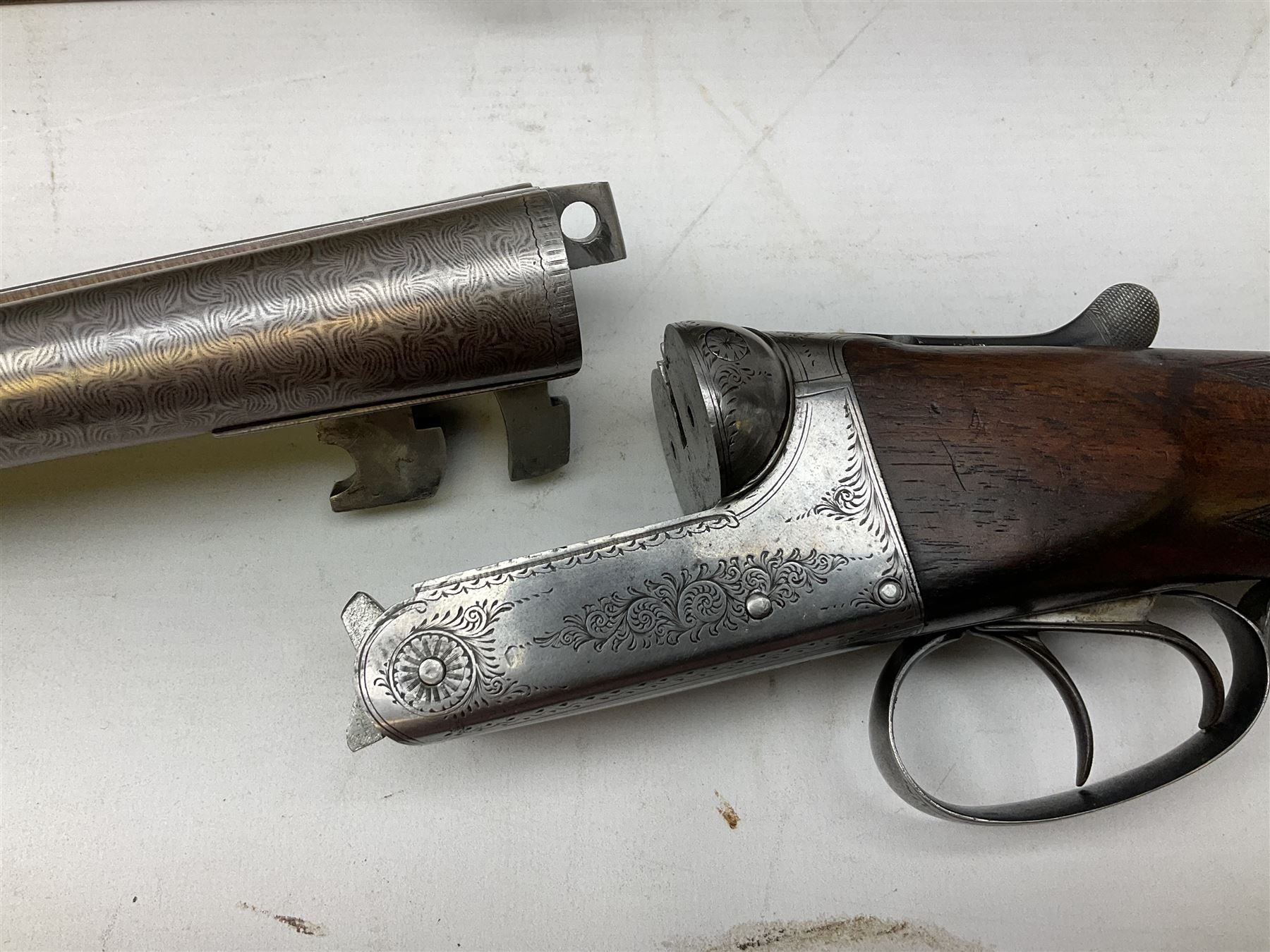 Midland Gun Company Birmingham & London 12-bore side-by-side box-lock non-ejector double barrel shotgun with 76cm damascus barrels, Prince of Wales style walnut stock with chequered grip and fore-end, top safety and engraved lock no.62160 L120cm overall; in scratch built baize lined wooden case. SHOTGUN CERTIFICATE REQUIRED.