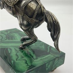 Modern silver model of a rearing horse, with ornate parcel gilt saddle and bridle, mounted upon a rectangular base, decorated with malachite panels to each side and upon four gilt bun feet, horse stamped 925, overall H14.5cm