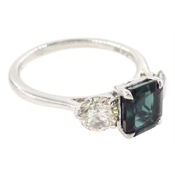 Platinum tourmaline and diamond three stone ring, single octagonal cut green tourmaline of approx 1.65 carat, with a round brilliant cut diamond set either side, stamped PT 950, total diamond weight approx 1.05 carat