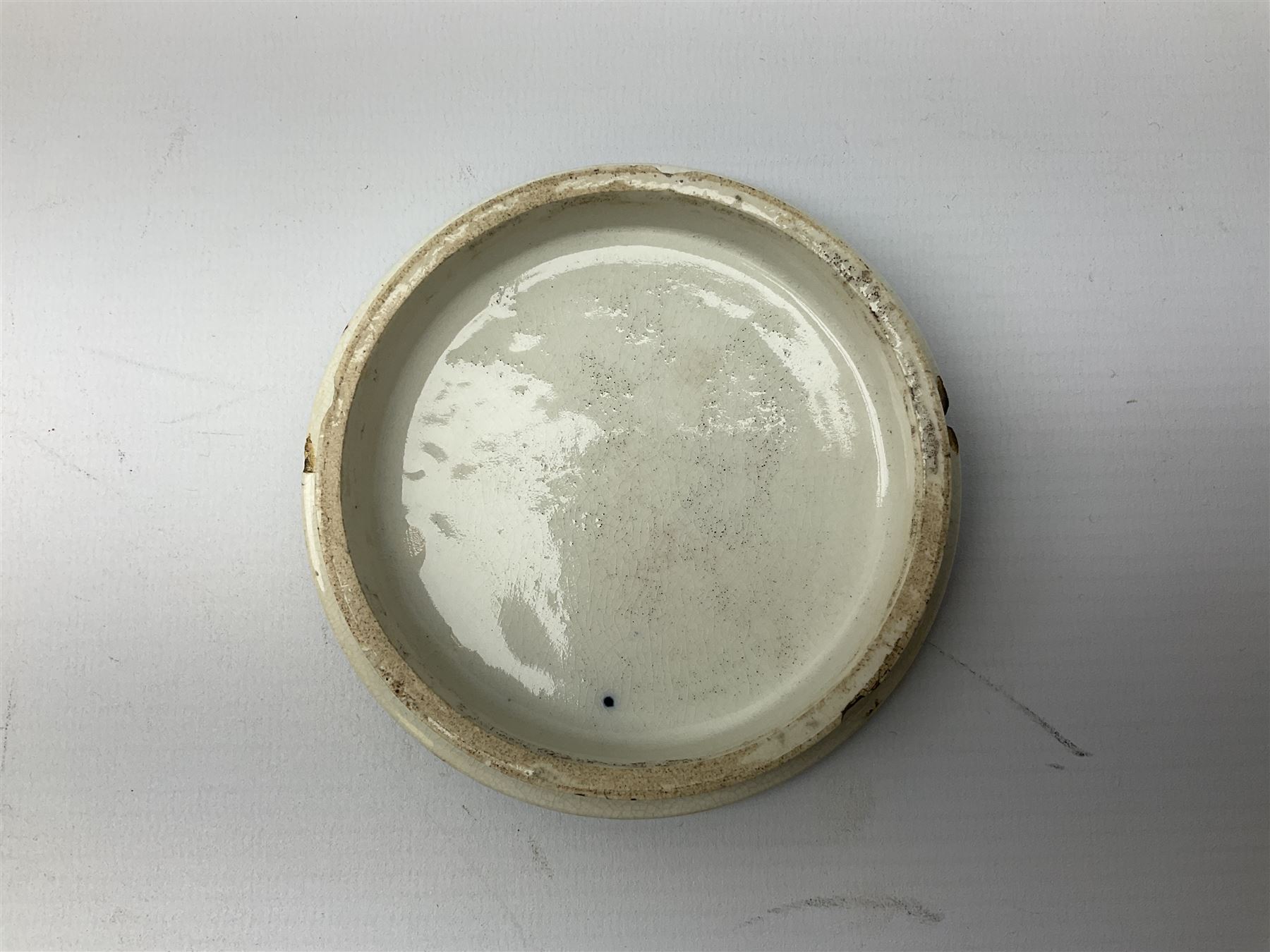 Late 19th Century pot lid bearing ‘The Residence of Anne Hathaway, Shakespeare’s Wife’ below printed decoration of thatched houses and animals scene, Royal Crown Derby Chinoiserie pattern coffee can and saucer, Rd No 758225, and an oval trinket box with gilt decoration bearing interlaced L mark to base (4)