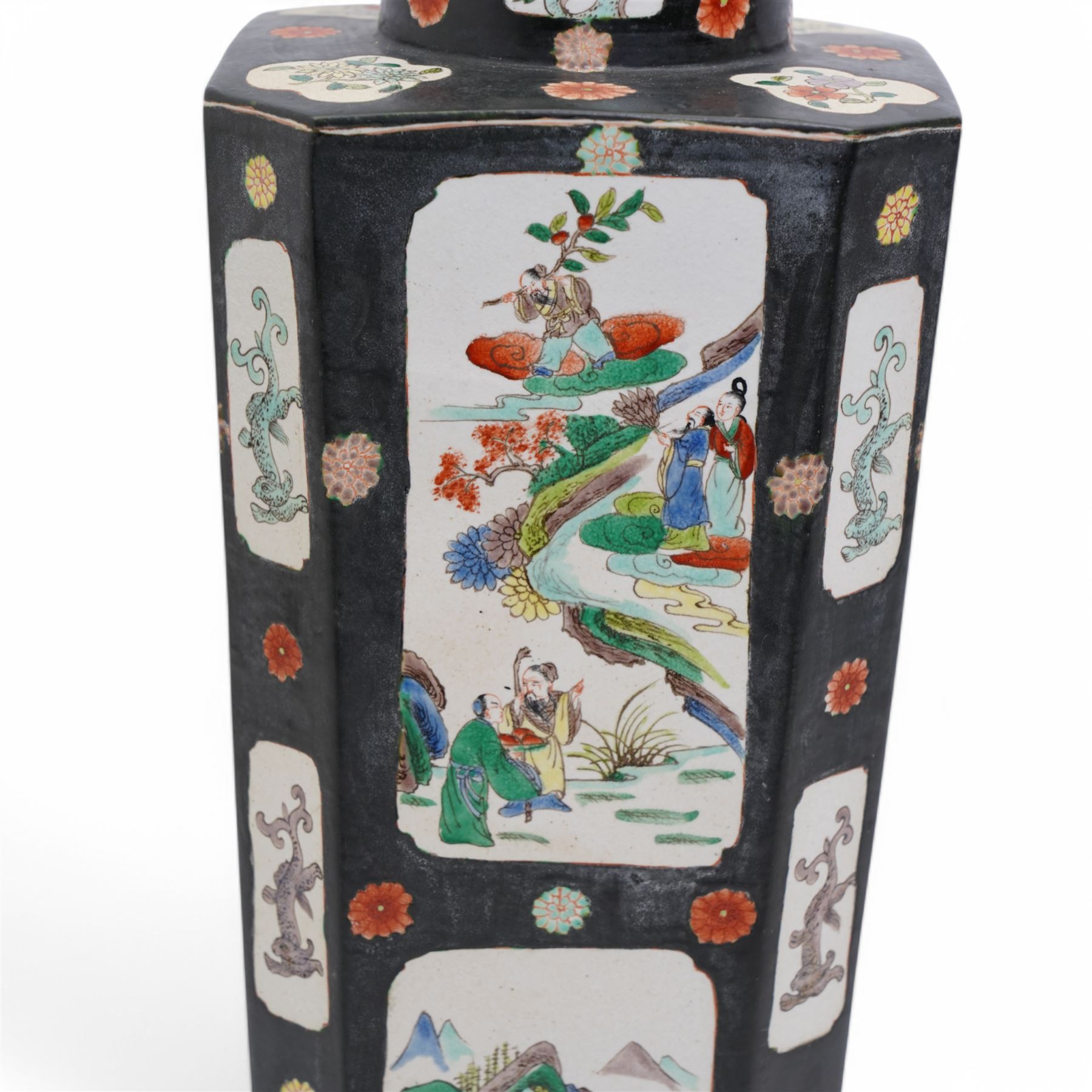 Chinese square section vase with canted corners decorated with panels of figures and landscapes on a black ground circa 1900 H51cm