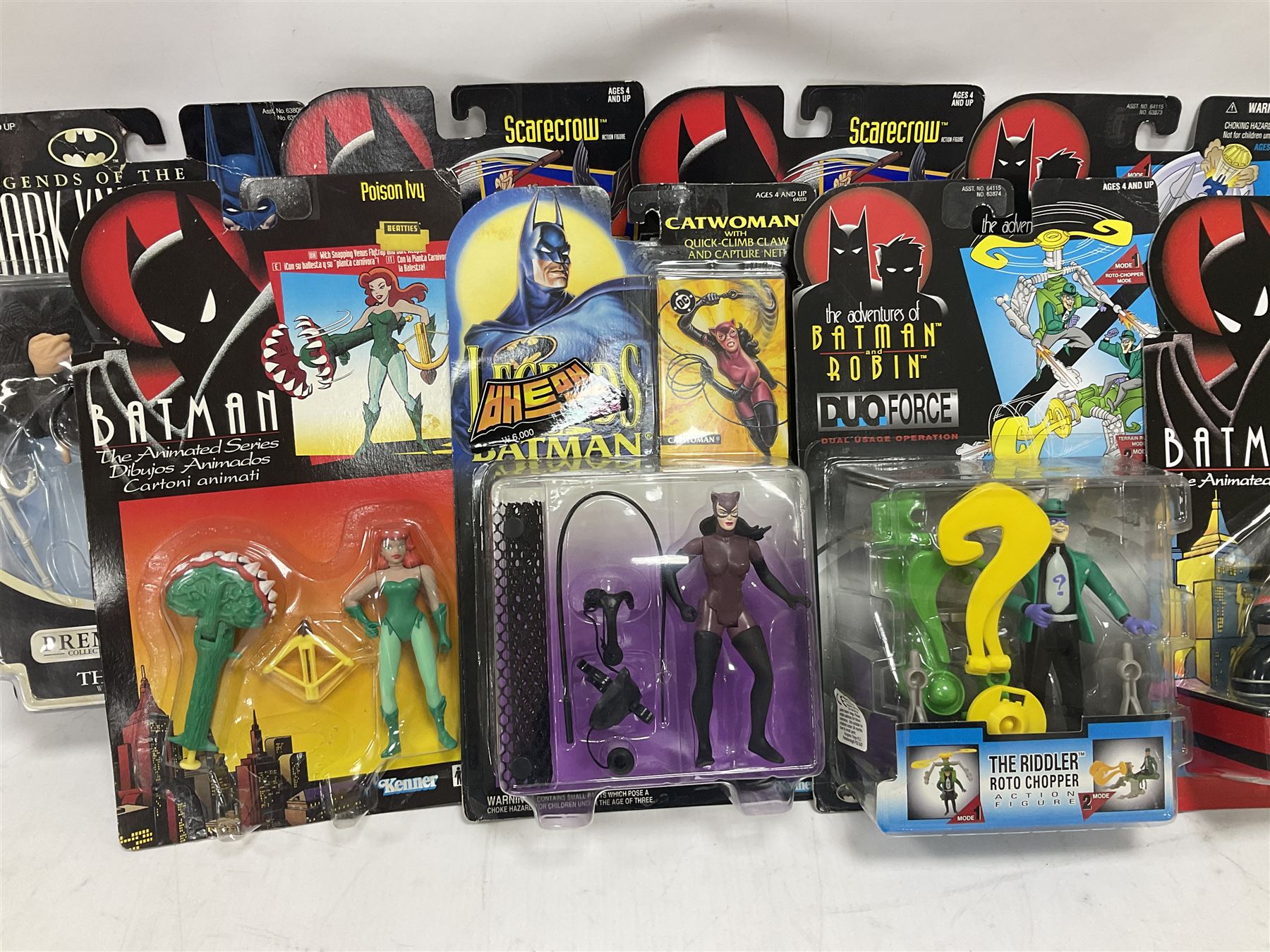 Twenty-four carded action figures of Batman (11) and other Super Heroes including Spiderman, DC Universe, Xyber 9 etc; all in unopened blister packs (24)