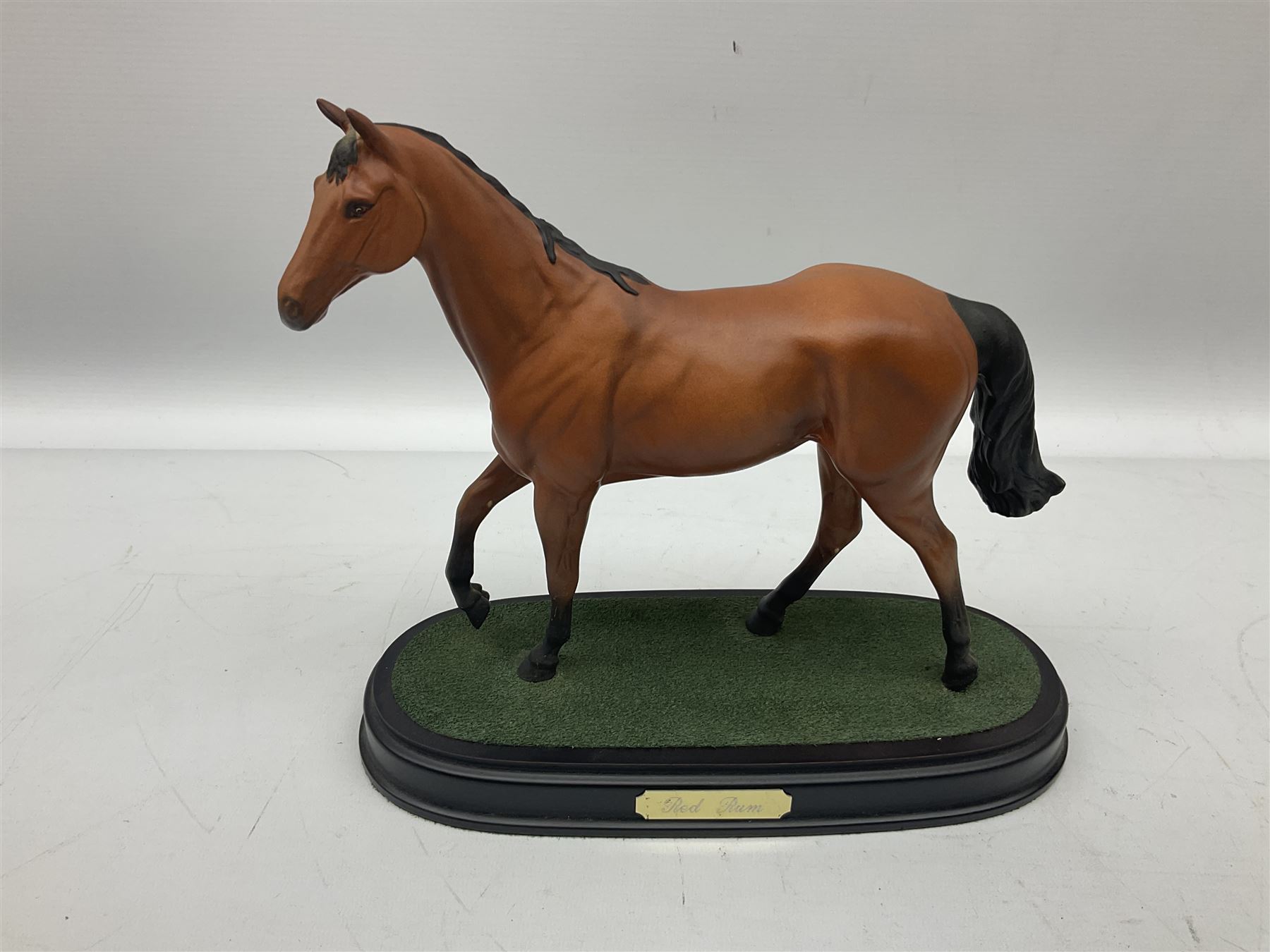 Beswick 'Mill Reef' horse figure, on a wooden plinth together with Beswick Ware horse figure 'Red Rum' on wood plinth, both with printed mark beneath
