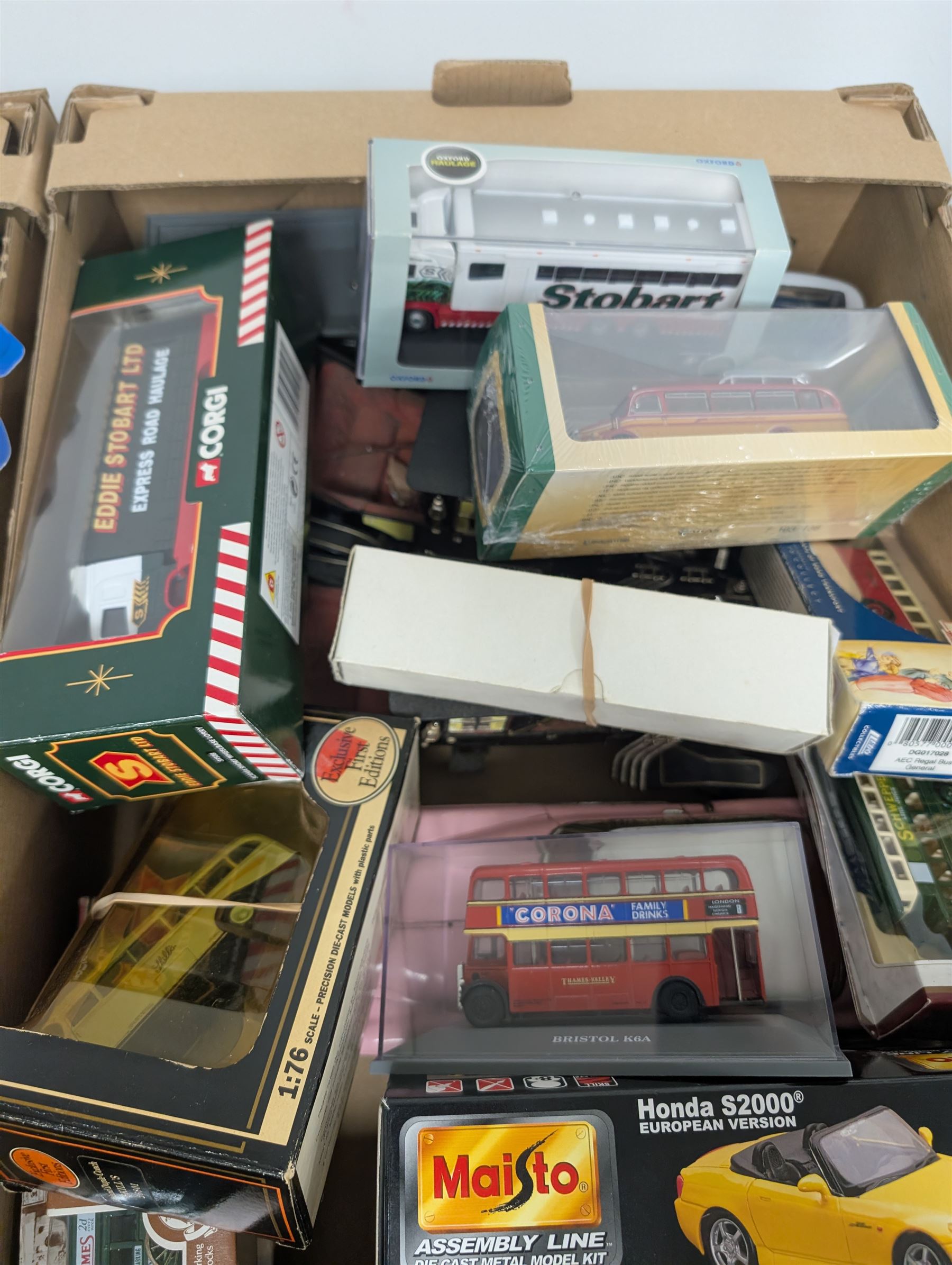Collection of diecast model vehicles, including two Munster Koaches, Maisto Hondo S2000, NewRay cars, Hotwheels, etc