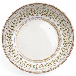 Pinxton porcelain trio, pattern no.193, comprising coffee can, teacup and saucer, decorated with green and gilt stylised sprigs and red and gilt dot borders, teacup with painted marks to base (3)