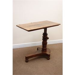 Victorian mahogany cantilever two-sided reading or bed table, shaped top with adjustable rests on turned column with locking handle, the shaped base with three bun feet, inset steel ball castors