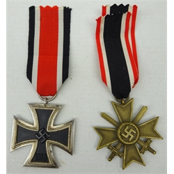  WWll German Iron Cross 2nd Class 1939 stamped on suspension '15', by Friedrich Orth & a War Merit 2nd Class with Swords, indistinctly stamped on suspension (2)  