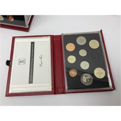 Seven The Royal Mint United Kingdom proof coin collections, dated 1985, 1986, 1987, 1989 including 'Claim of Right' and 'Bill of Rights' two pound coins, 1993, 1994 and 1996, all in red folders with certificates