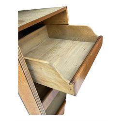 Late Victorian walnut triple combination wardrobe, projecting moulded and dentil cornice, central shaped bevelled mirror glazed door, cartouche and curled leaf carved panels over figured walnut veneered panels, fitted with drawer to base, on bracket feet