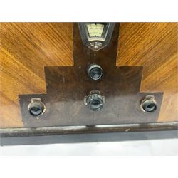 Two 1930s radios, comprising Art Deco Lotus valve example with copper fixtures, H50cm W37cm  together with a Swan Aerodyne example decorated with inlay