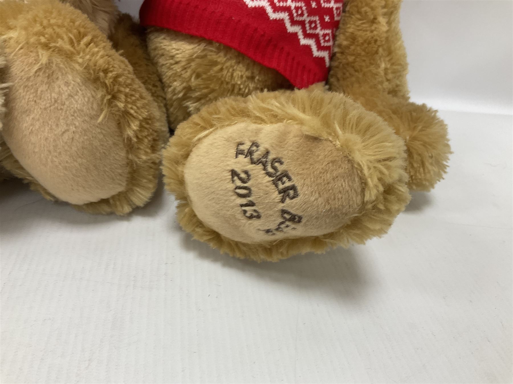 Eight annual Fraser Bears, by House of Fraser, dating between 2012 and 2019, tallest H35cm