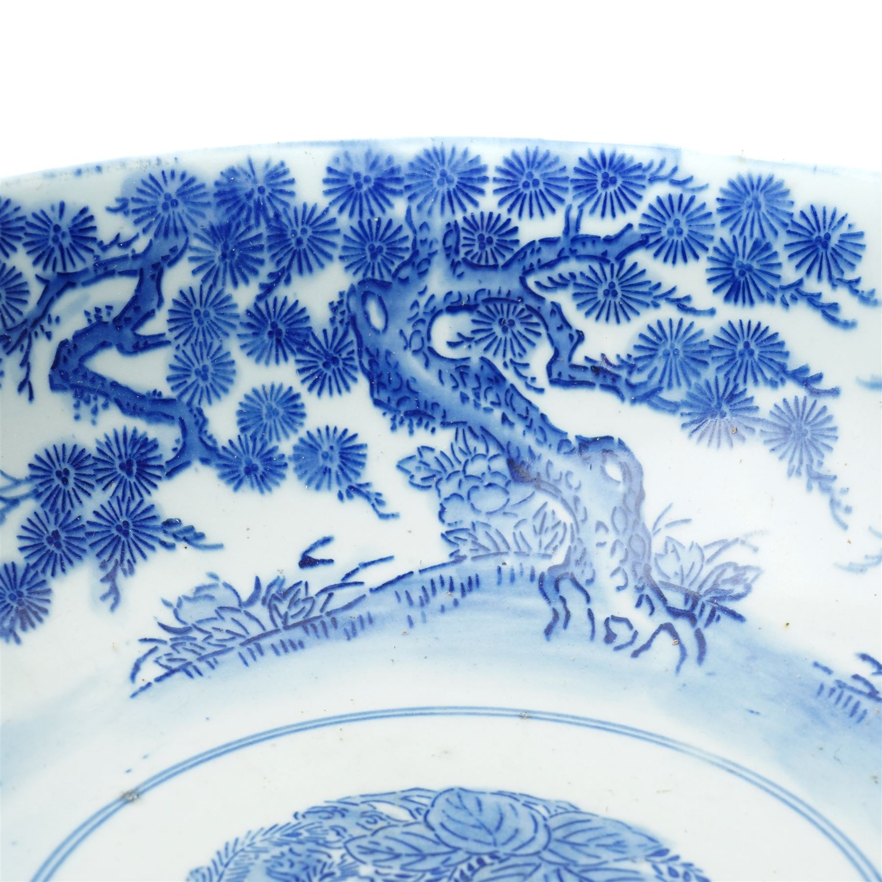Japanese blue and white bowl, the central bowl painted with bird, surrounded by a border of trees, unmarked, D31cm 