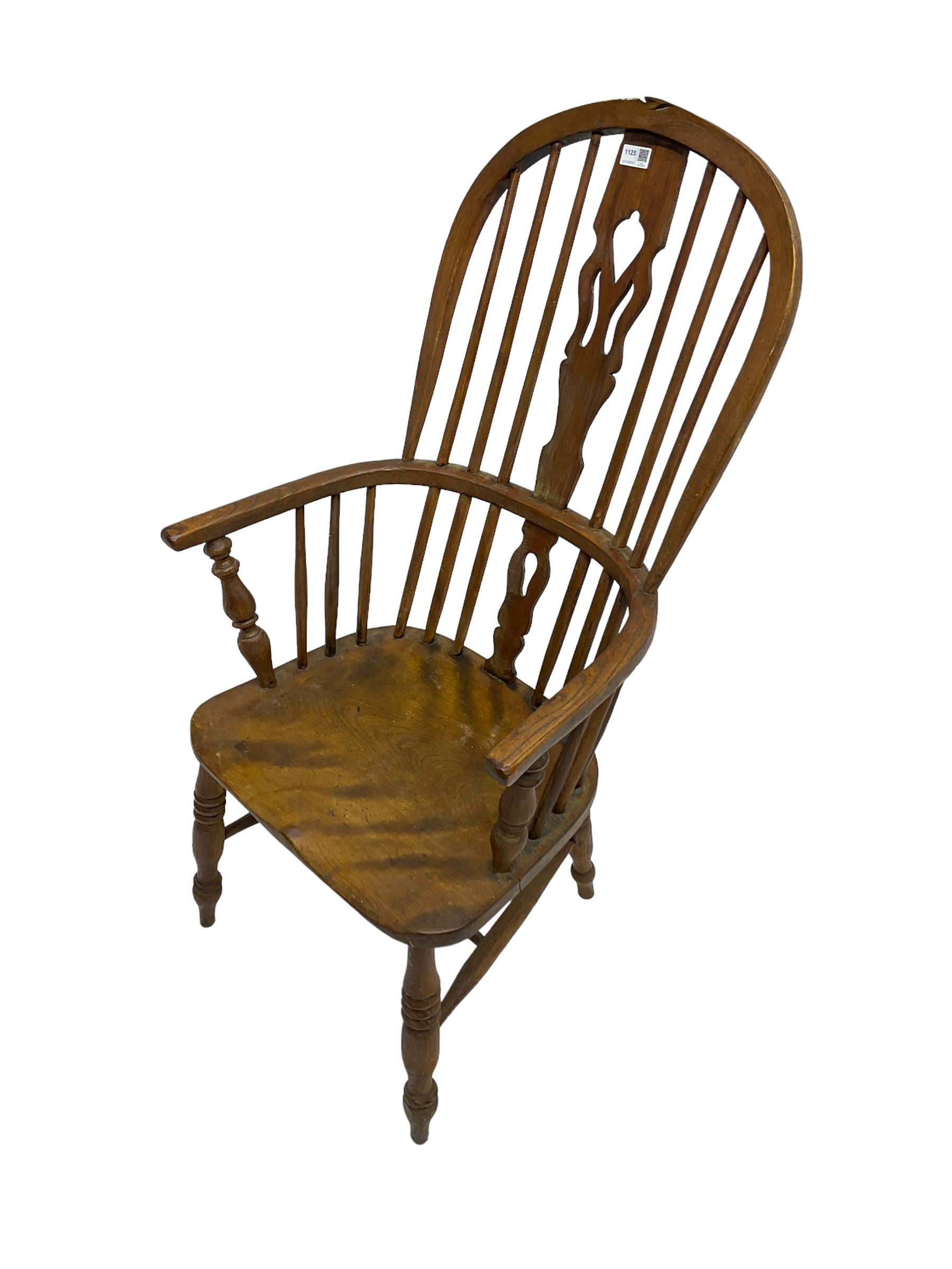 19th century elm and beech Windsor armchair, stick back with pierced splat, on turned supports with H-shaped stretchers