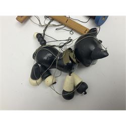 Pelham Puppet - three puppets comprising a painted wooden duck with felt mouth and wings with metal joints H12cm, in original box and instructions; and two further examples Type A cat with a hollow body H12cm, and a boy H23cm (3) 