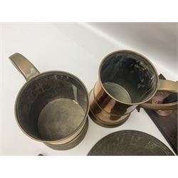 Two 19th century copper tankards, one with weighted wooden base, together with copper and wooden mechanical bellows, sundial and other metalware 