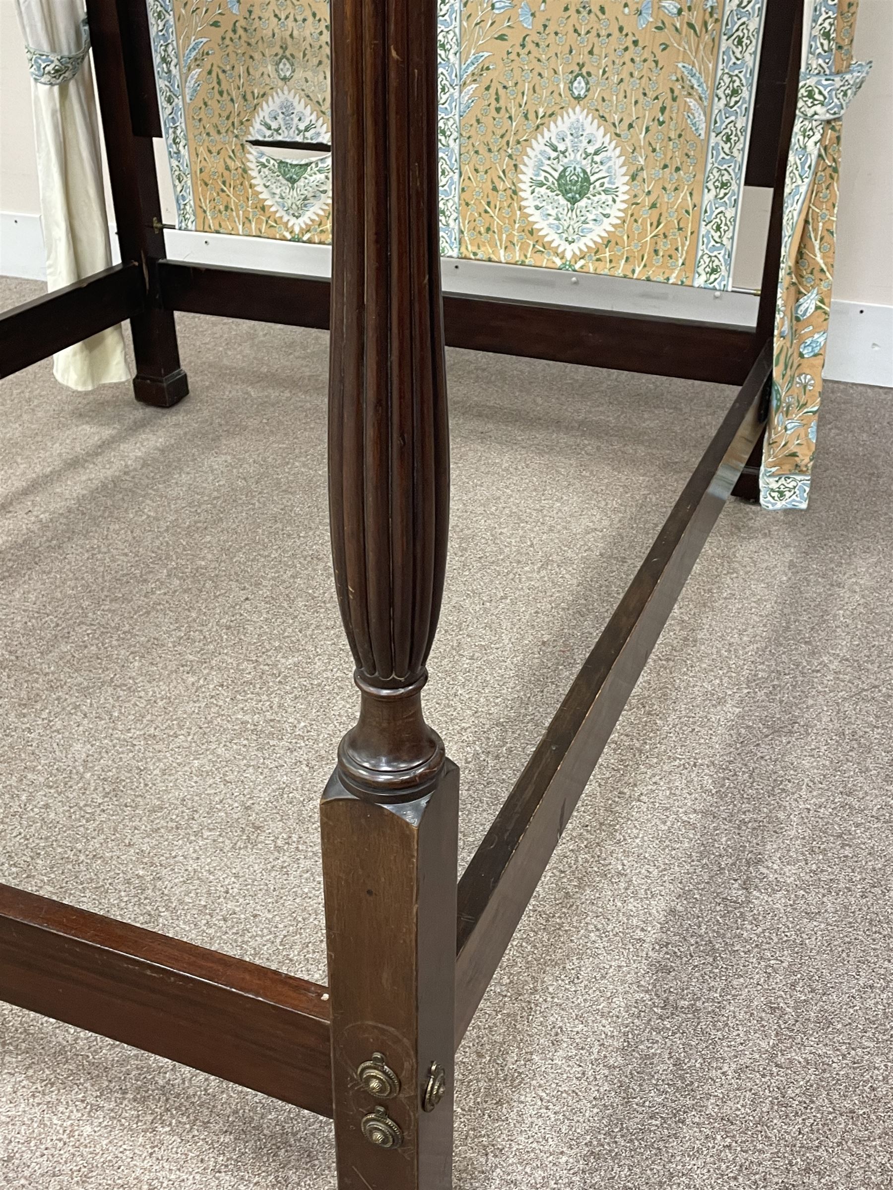 Early 20th century Chippendale style mahogany four poster bed, projecting dentil cornice with egg and dart mouldings and blind fretwork frieze, tapering reeded supports, with bed base