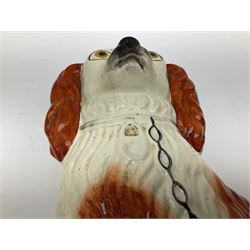 Pair of Victorian Staffordshire spaniels, H29cm