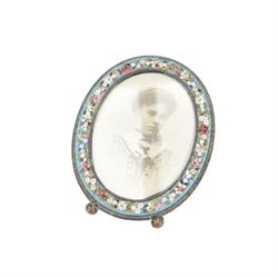 Six micro mosaic picture frames, all decorated with flowers with blue and green boarders 