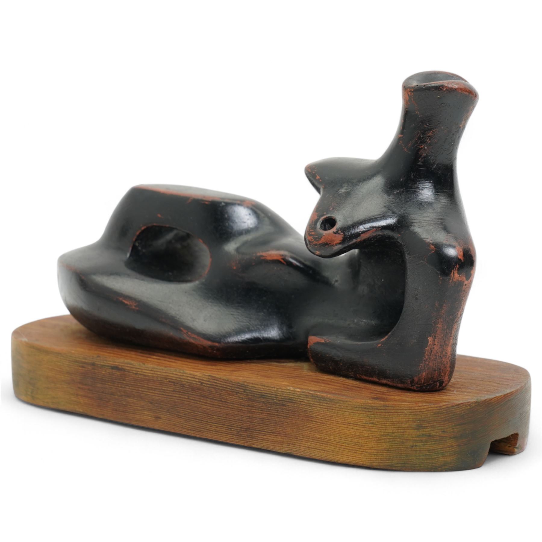 After Henry Moore (British 1898-1986): 'Reclining Figure', terracotta maquette sculpture, base marked with affixed catalogue label inscribed ‘Reclining Figure: 1939 Archive 0074229', W20cm H12cm
Notes: the original is on display at the Tate Britain