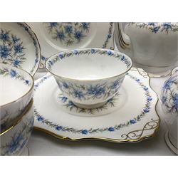 Tuscan Love in the Mist pattern tea wares, comprising teapot, fourteen teacups, fourteen saucers, fourteen side plates, milk jug, twin handled lidded sucrier, and two cake plates