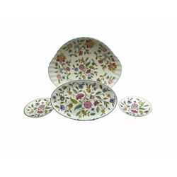 Minton Haddon Hall pattern tea and dinner wares, including basket dish, two covered tureens, six dinner plates, eight dessert plates, twelve tea plates, six soup bowls, six cereal bowls, teapot, coffee pot, milk jug, covered sucrier twelve tea cups and saucers, six mugs, footed bon bon dish, pair of candlestick holders, cake knife and slice etc (81)