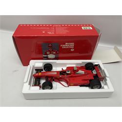 Four Paul's Model Art 1:18 scale Michael Schumacher Collection die-cast racing cars - Ferrari F310B; Ferrari F310/2; Benneton Renault B195; and Ferrari F300; all boxed (4)