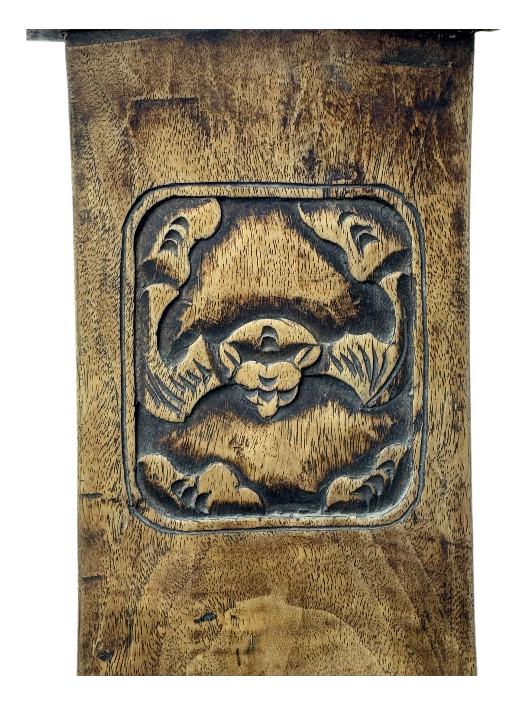 Late 19th century Chinese Qing dynasty high chair, rectangular back with central splat carved with stylised bat motif, applied brasswork to the arms and seat, on rounded supports with double stretcher