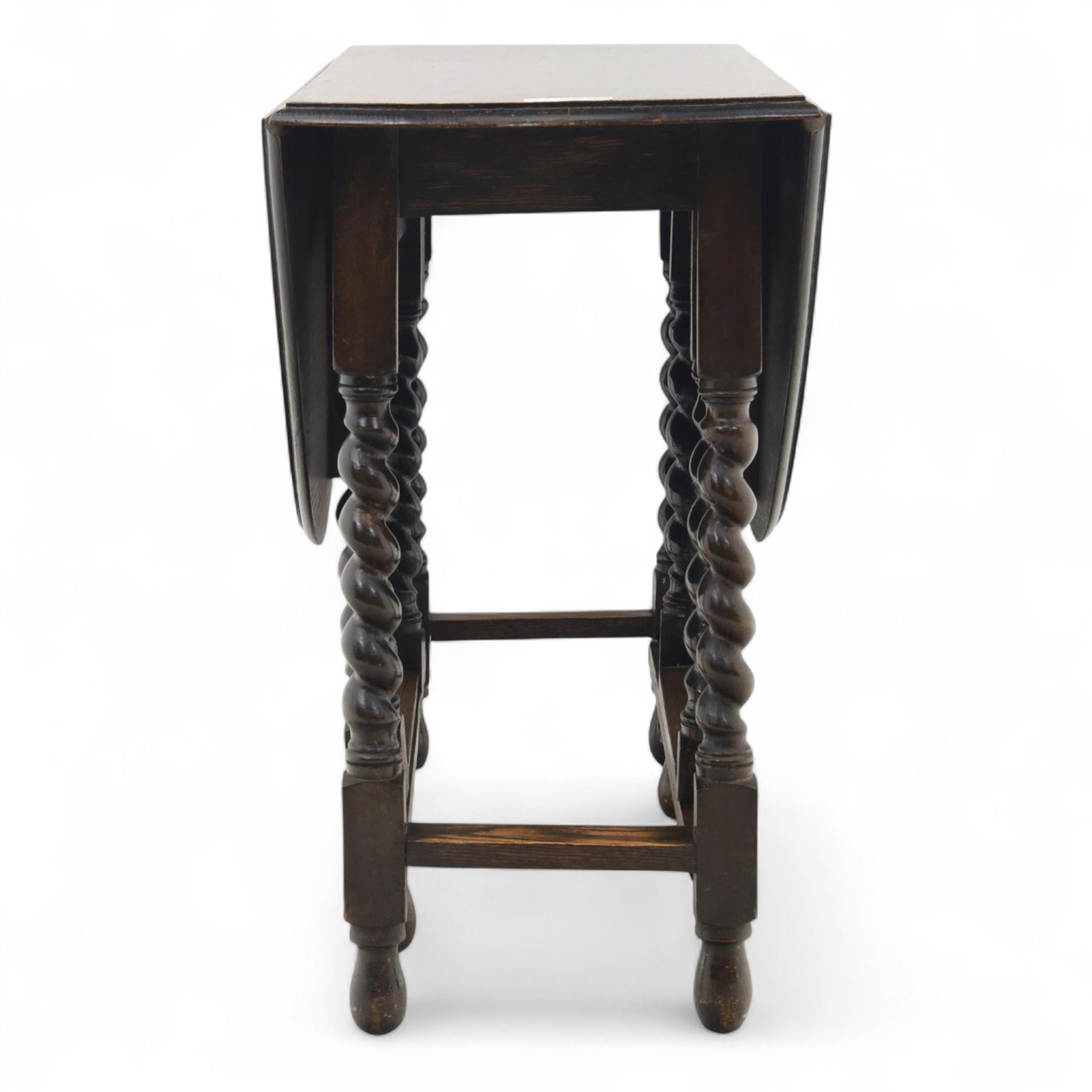 20th century oak gateleg table, with oval fold-out top supported on turned barley twist legs and stretchers (Extended 116cm)