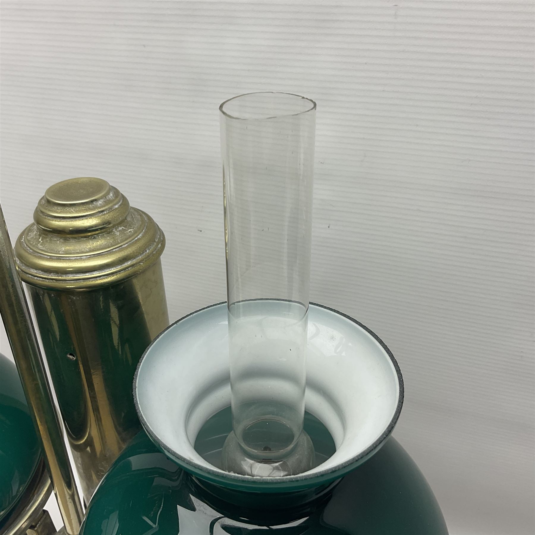 Miller & Sons Piccadilly polished brass double adjustable student's oil lamp, with green glass shades, H52cm