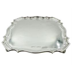 1920's silver salver, of square form with Chippendale type rim, upon four scroll feet, hallmarked Lee & Wigfull, Sheffield 1929, D26.5cm, approximate weight 19.86 ozt (618 grams)