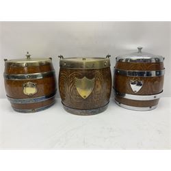 Five early 20th century biscuit barrels with silver-plated mounts
