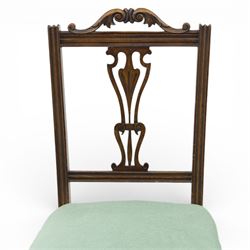 Late Victorian mahogany side chair, the carved cresting rail above a pierced and carved splat with lyre-form detail, the back panel inset with cane work, drop-in upholstered seat in pale green fabric with braid trim, raised on cabriole supports