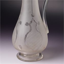 Victorian opaque glass ewer with clear cut decoration and clear glass handle H28cm and an etched glass claret jug with silver plated cover and handle H31cm