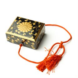 Japanese Meiji period lacquerware box with maki-e decoration, decorated centrally with the...