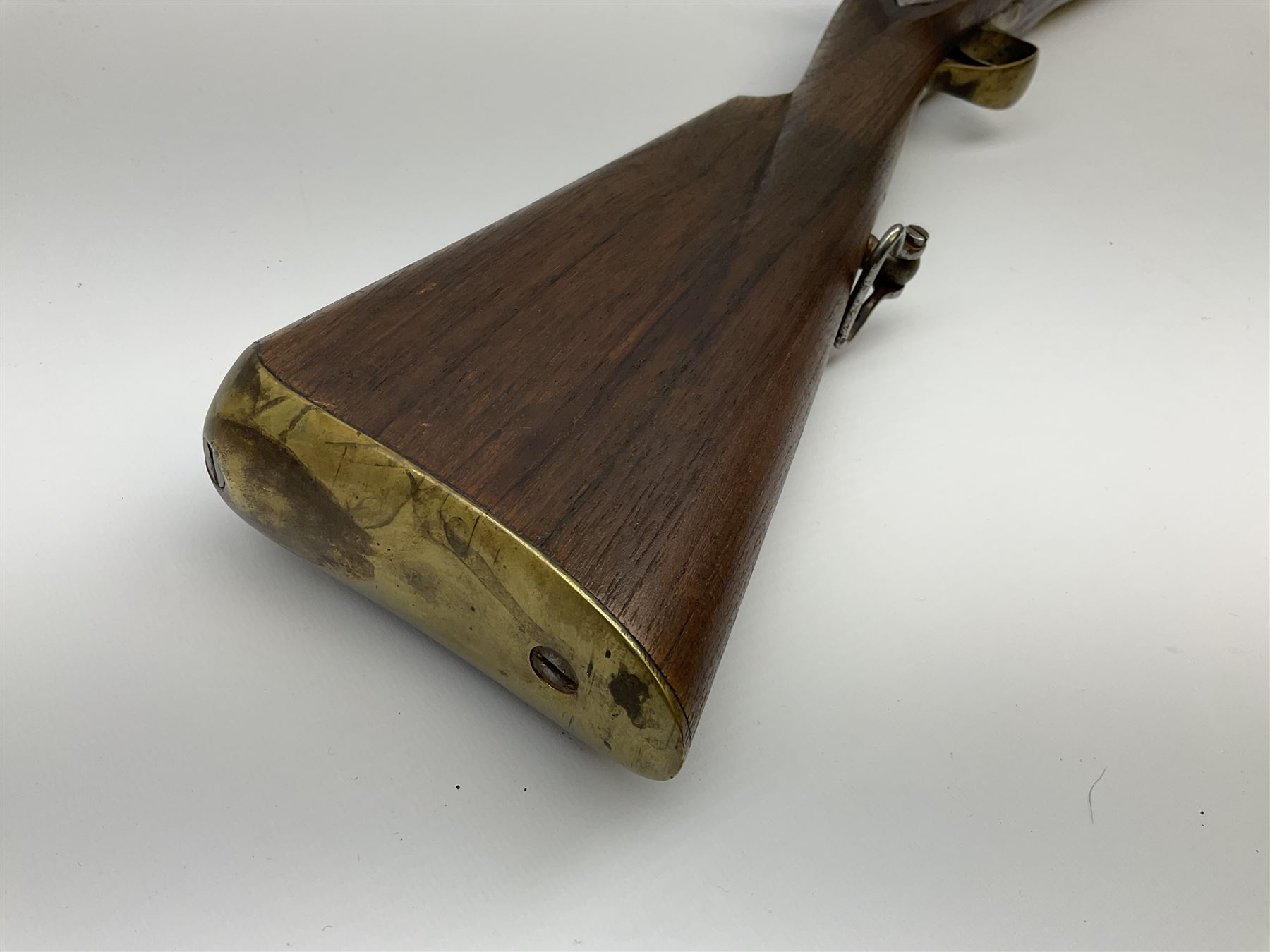 Reproduction 11-bore black-powder blunderbuss, the 61.5cm barrel with black-powder marks and ramrod under, walnut full stock with steel lock and brass fittings and two sling swivels, serial no.155, L101cm overall SHOTGUN CERTIFICATE REQUIRED