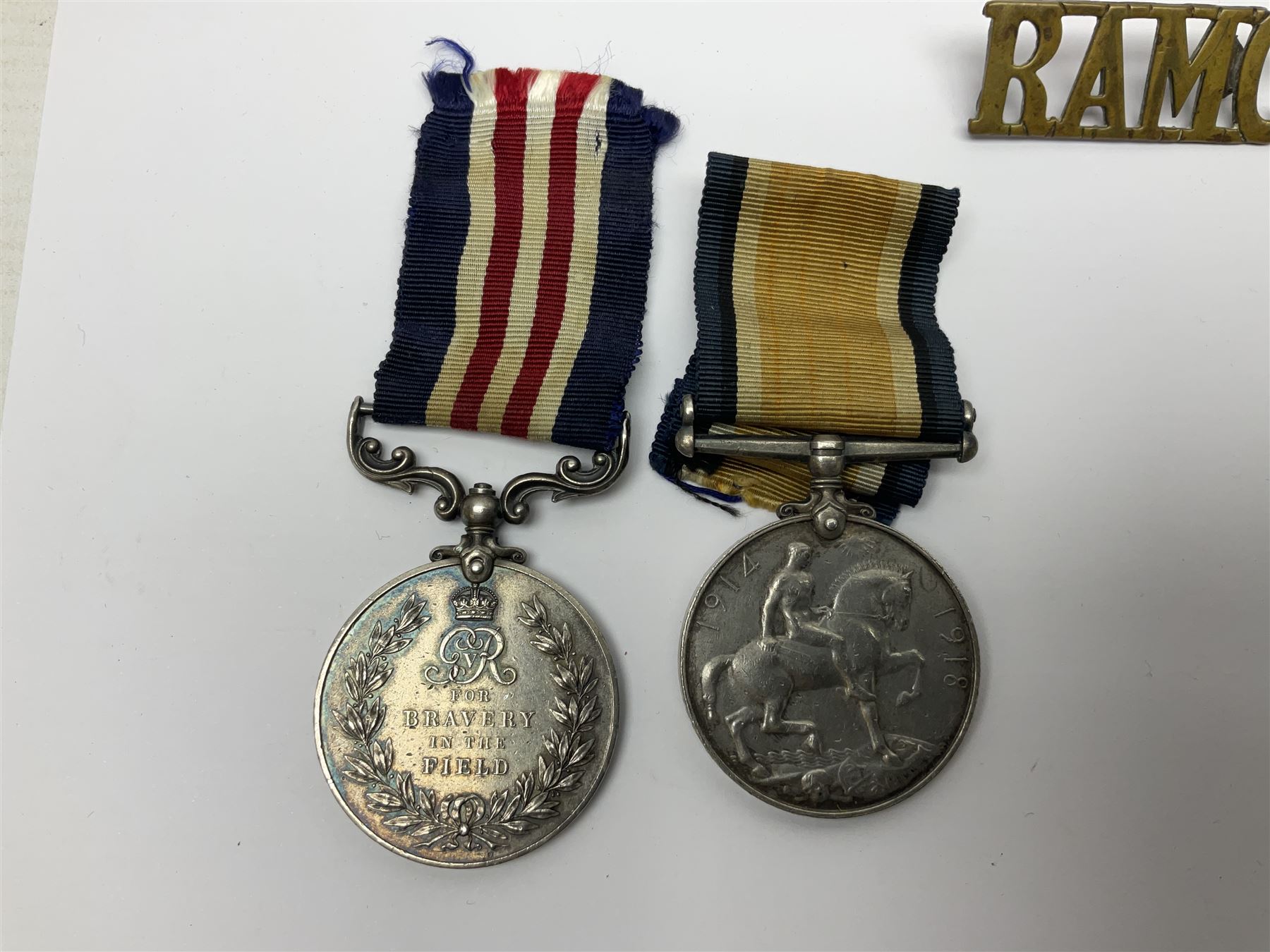 WWI RAMC Military Medal group of four comprising MM awarded to 439278 Pte. R.W. Sainsbury 1/3 S.M.F.A. R.A.M.C. T.F., British War Medal, Victory Medal and 1914-15 Star awarded to 2160 Pte. R.W. Sainsbury R.A.M.C.; all with ribbons; together with RAMC shoulder title
