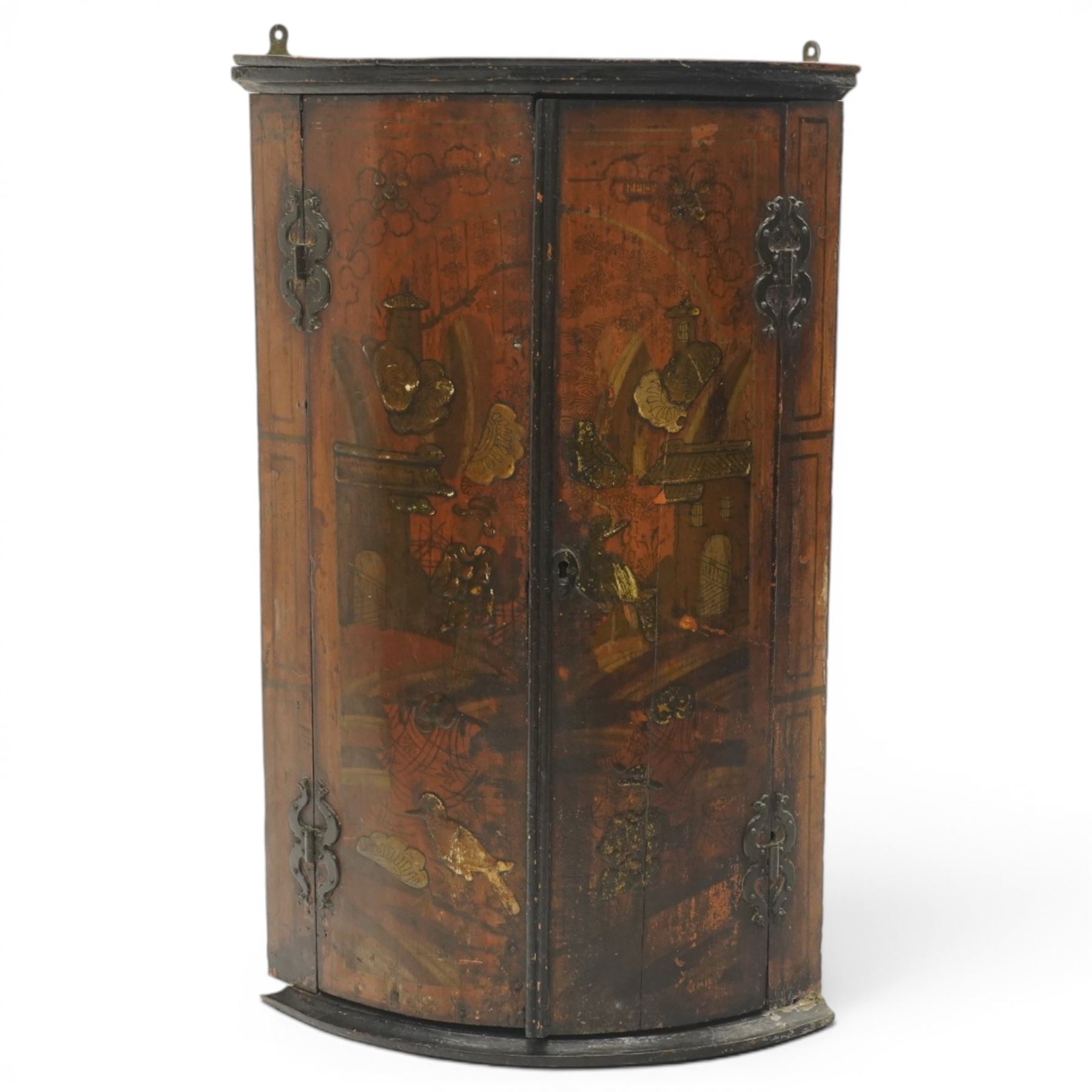George III period lacquered chinoiserie cylindrical corner cabinet, decorated with traditional pagoda and exotic bird scenes, enclosing two shelves